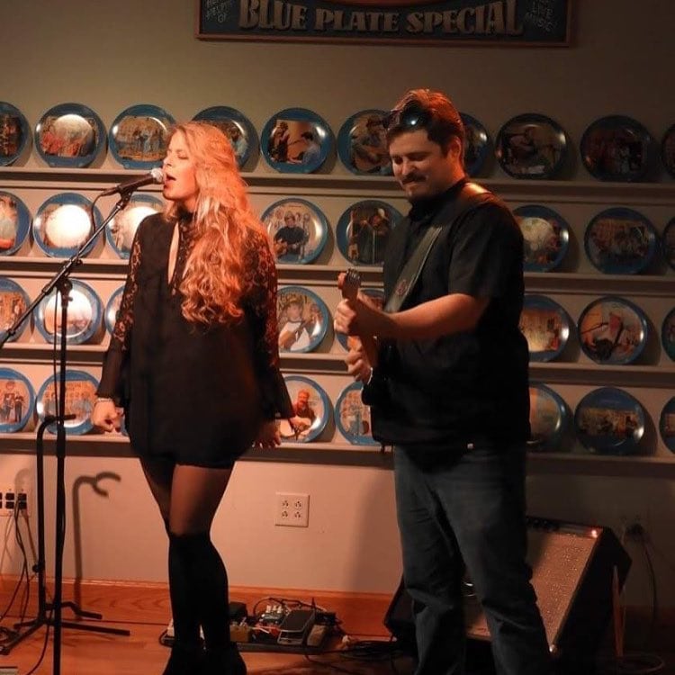 Soulmates Duo Performing Live Guitar And Vocals At An Event