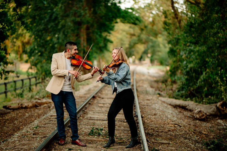 Downbeat Duo Performing Violin And Viola Outdoors In Los Angeles