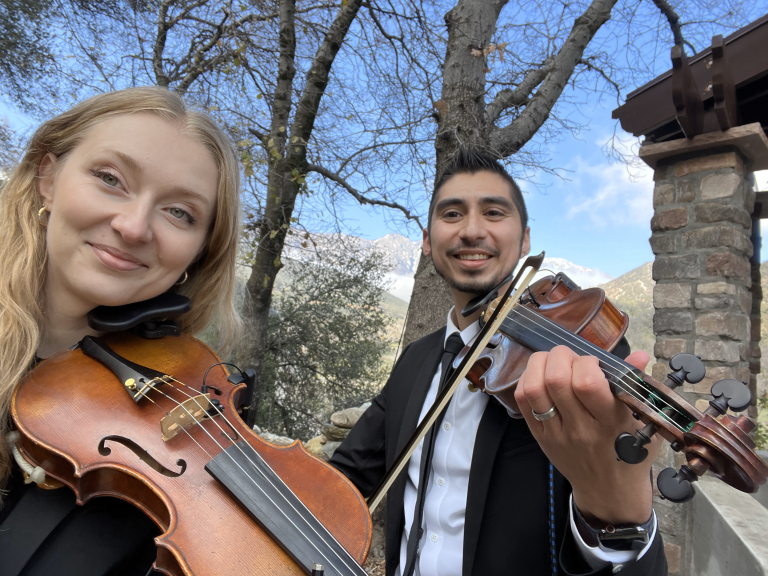 Downbeat Duo Performing Violin And Viola At An Outdoor Event In Los Angeles