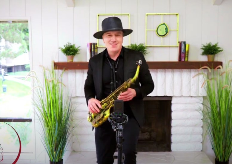CJ performing live as a Los Angeles Latin saxophonist
