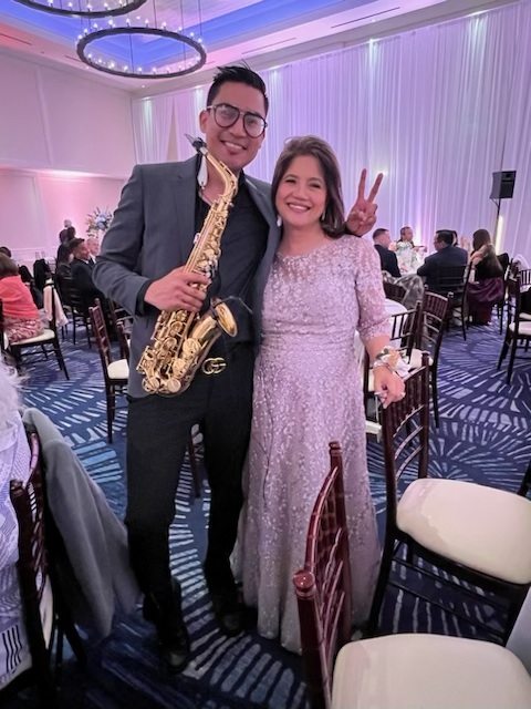 Interactive live saxophone performance by Amin at an event