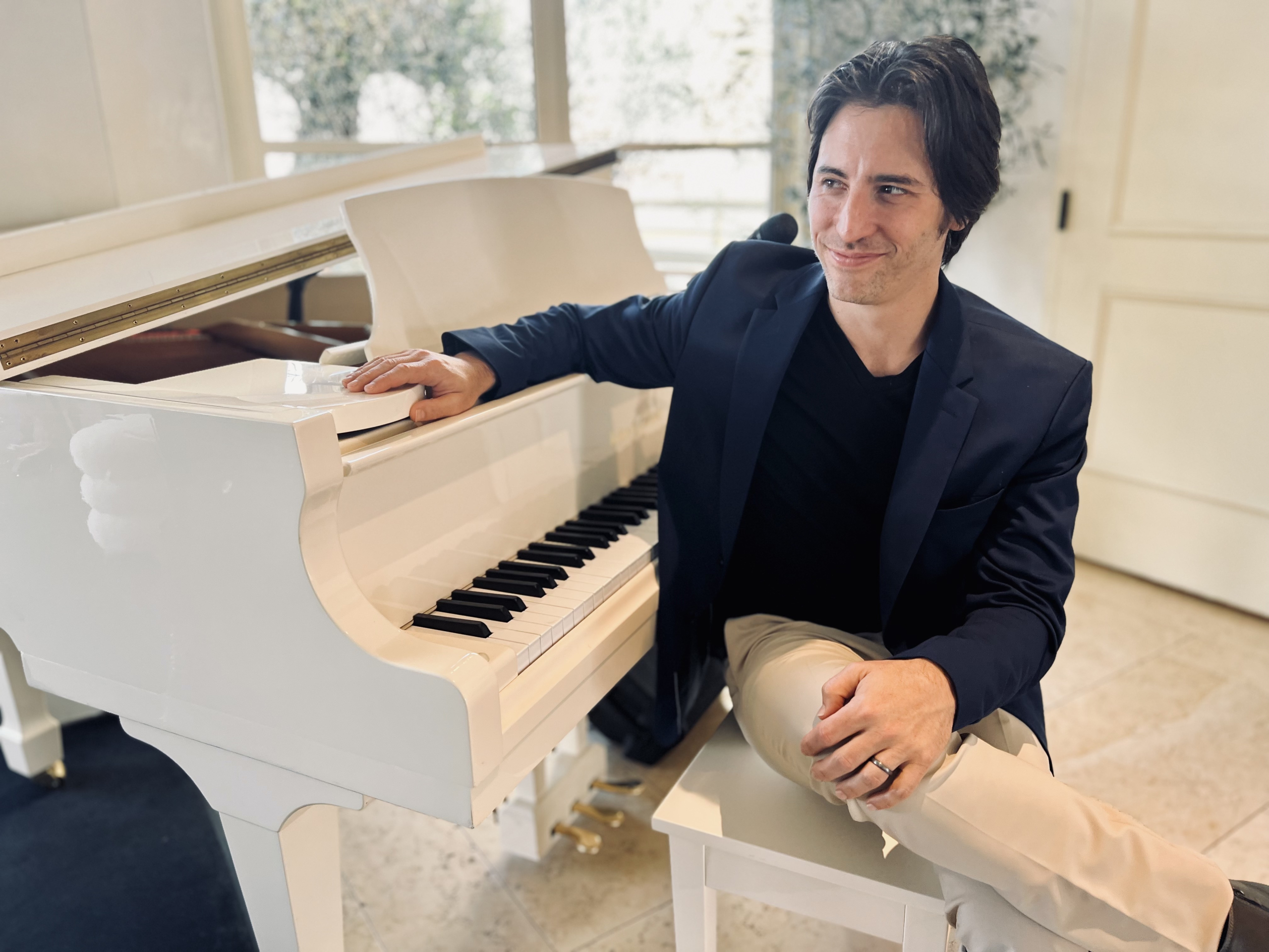 Matthew pianist and singer performing live at Ocdamia Music Group