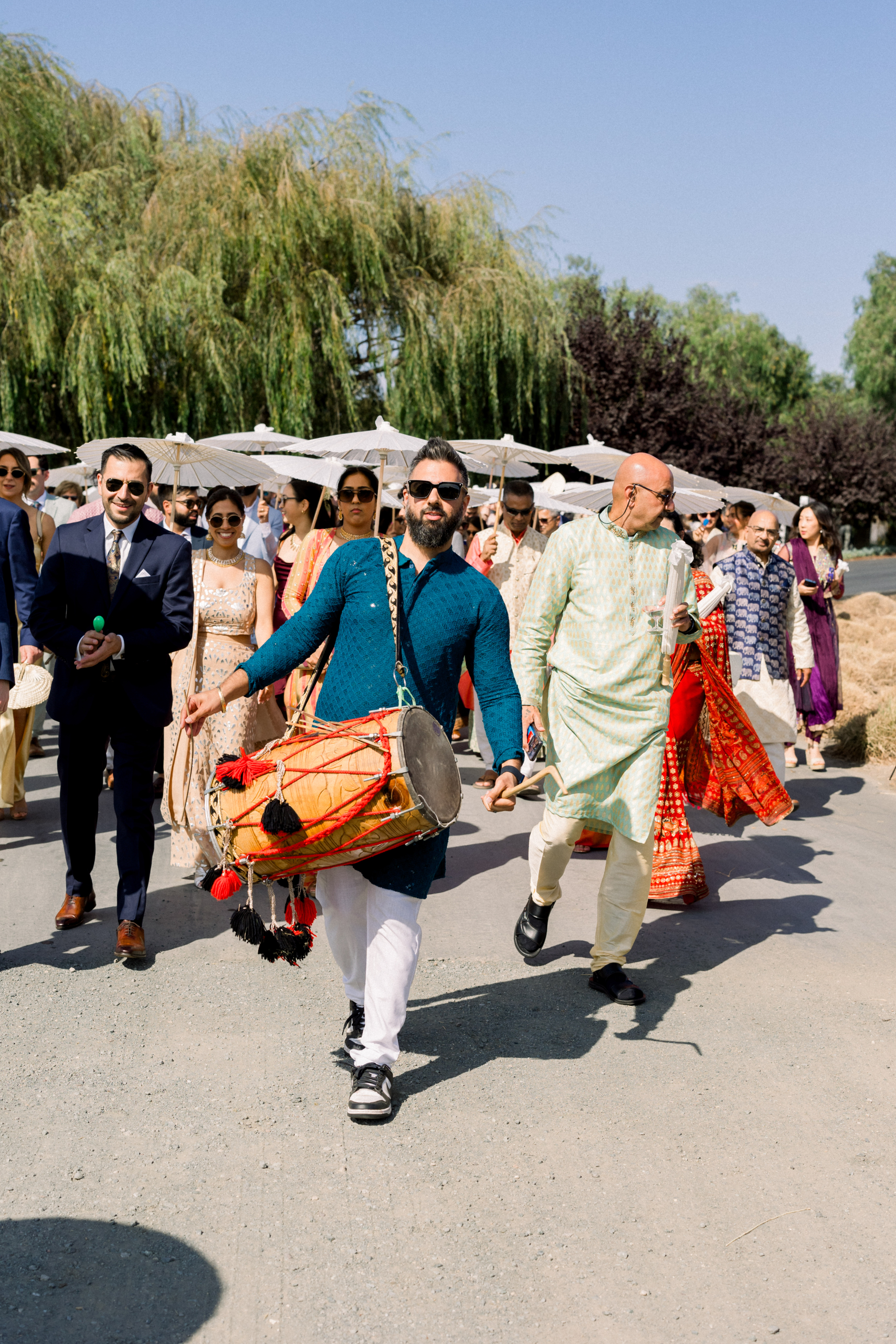 Wedding Baraat celebration with live performance energy