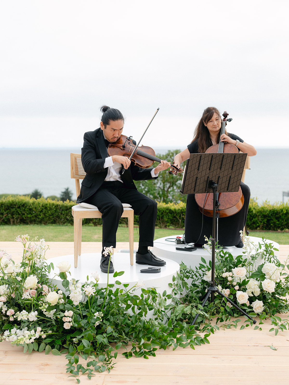String musicians performing live music at a wedding reception