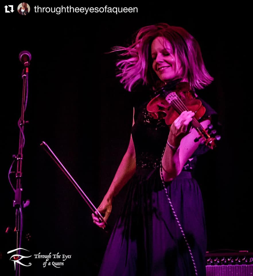 Rachel performing as a strolling electric violinist in Los Angeles