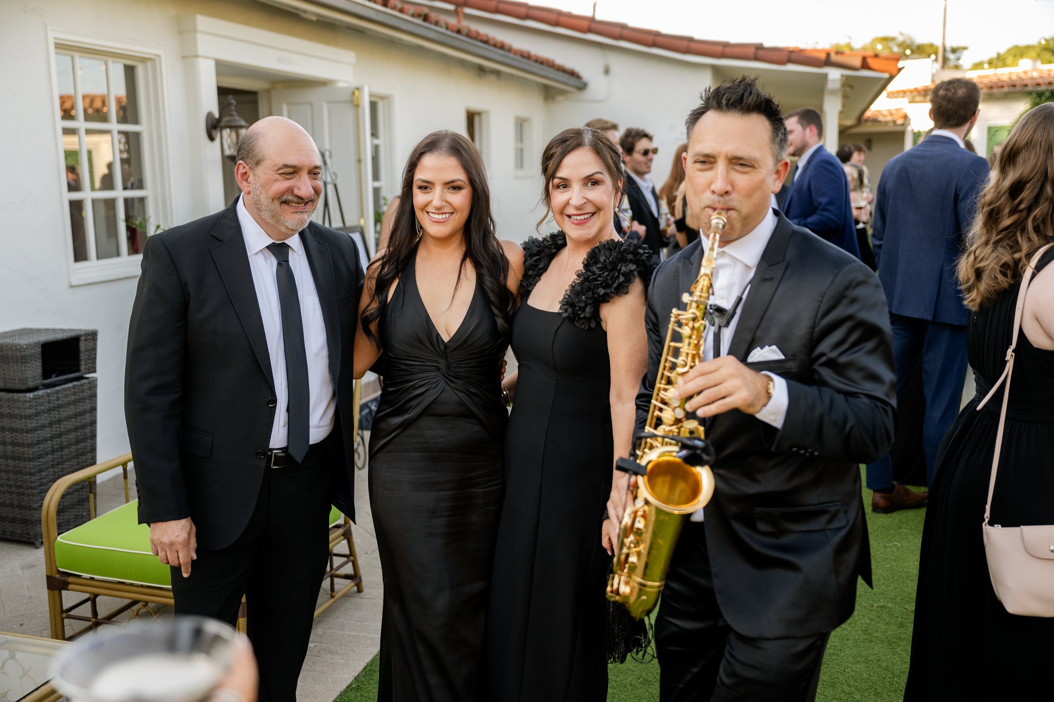 Kevin playing live saxophone during cocktail hour