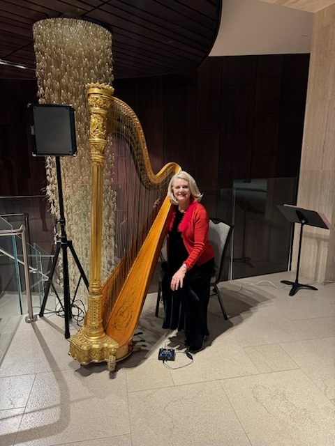 Peggy Los Angeles harpist with concert harp