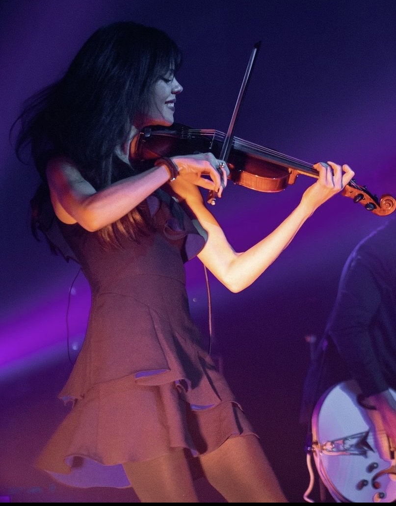 Miriam performing an upbeat live violin set in Los Angeles