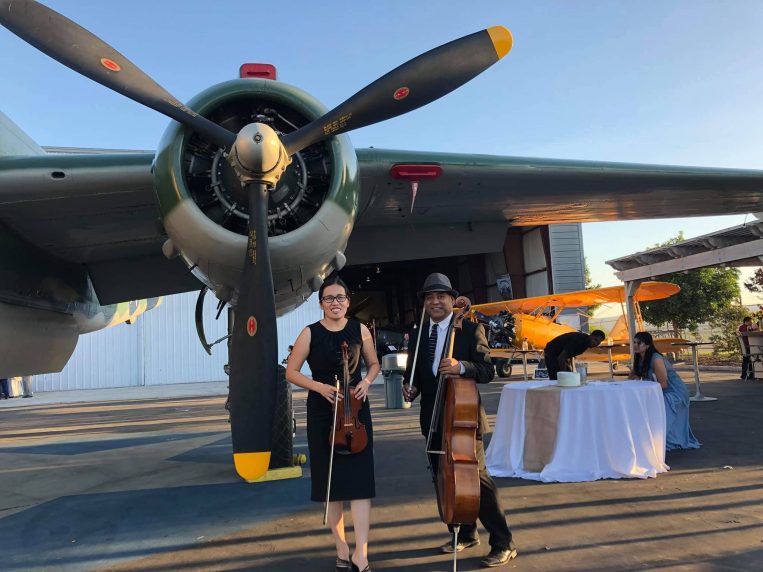 Cecile, a classical violinist, performing live violin at a private event