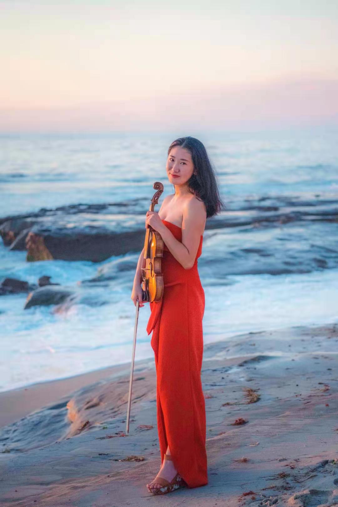 Portrait Of Tingting Holding A Violin Near The Beach