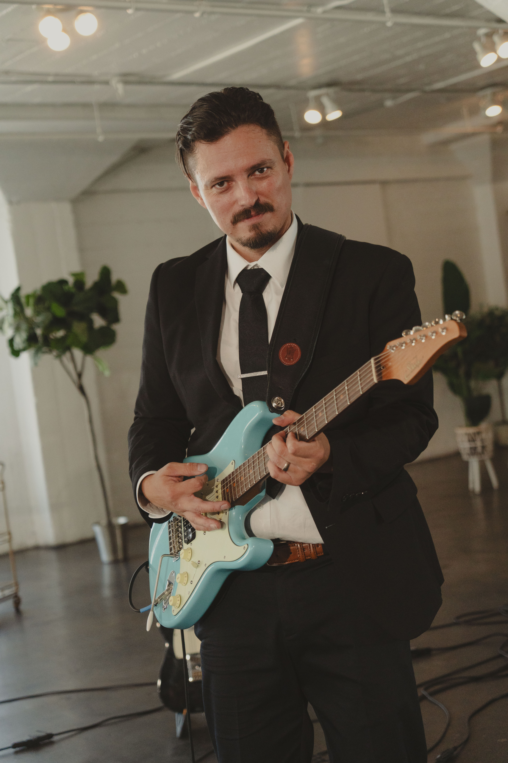 Crowd Control guitarist performing live for an Orange County event