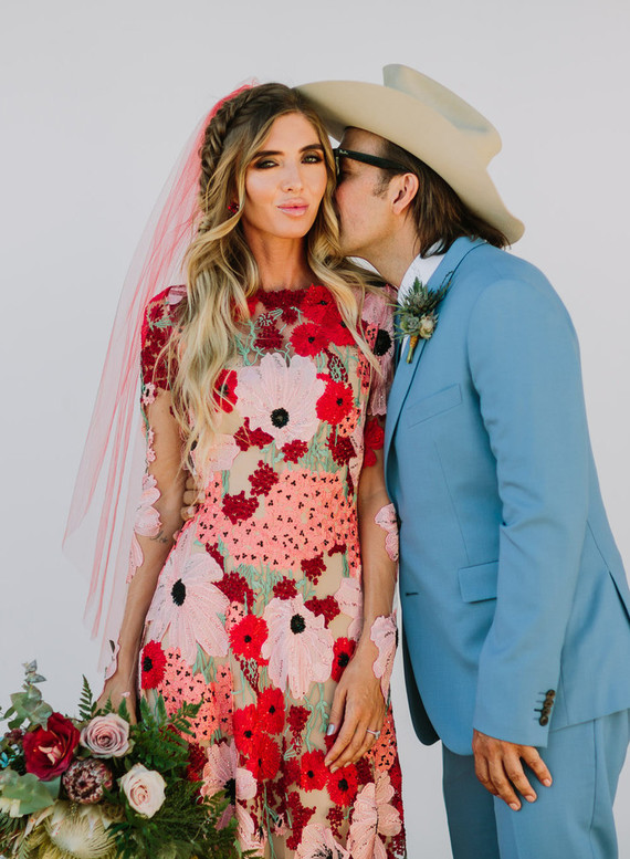 Desert wedding with a pink floral dress featured on 100 Layer Cake