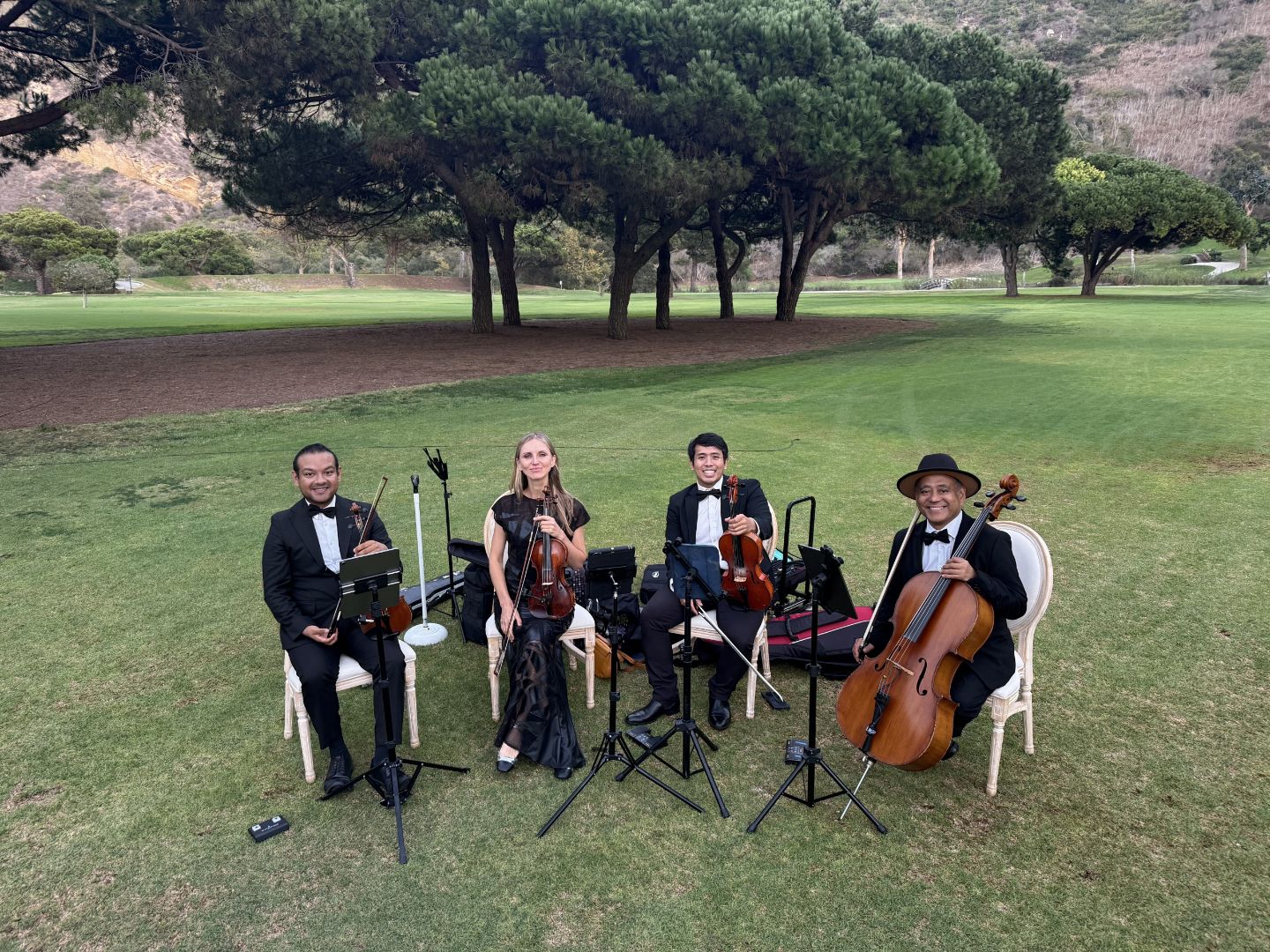 Wedding string quartet musicians at an outdoor Southern California venue